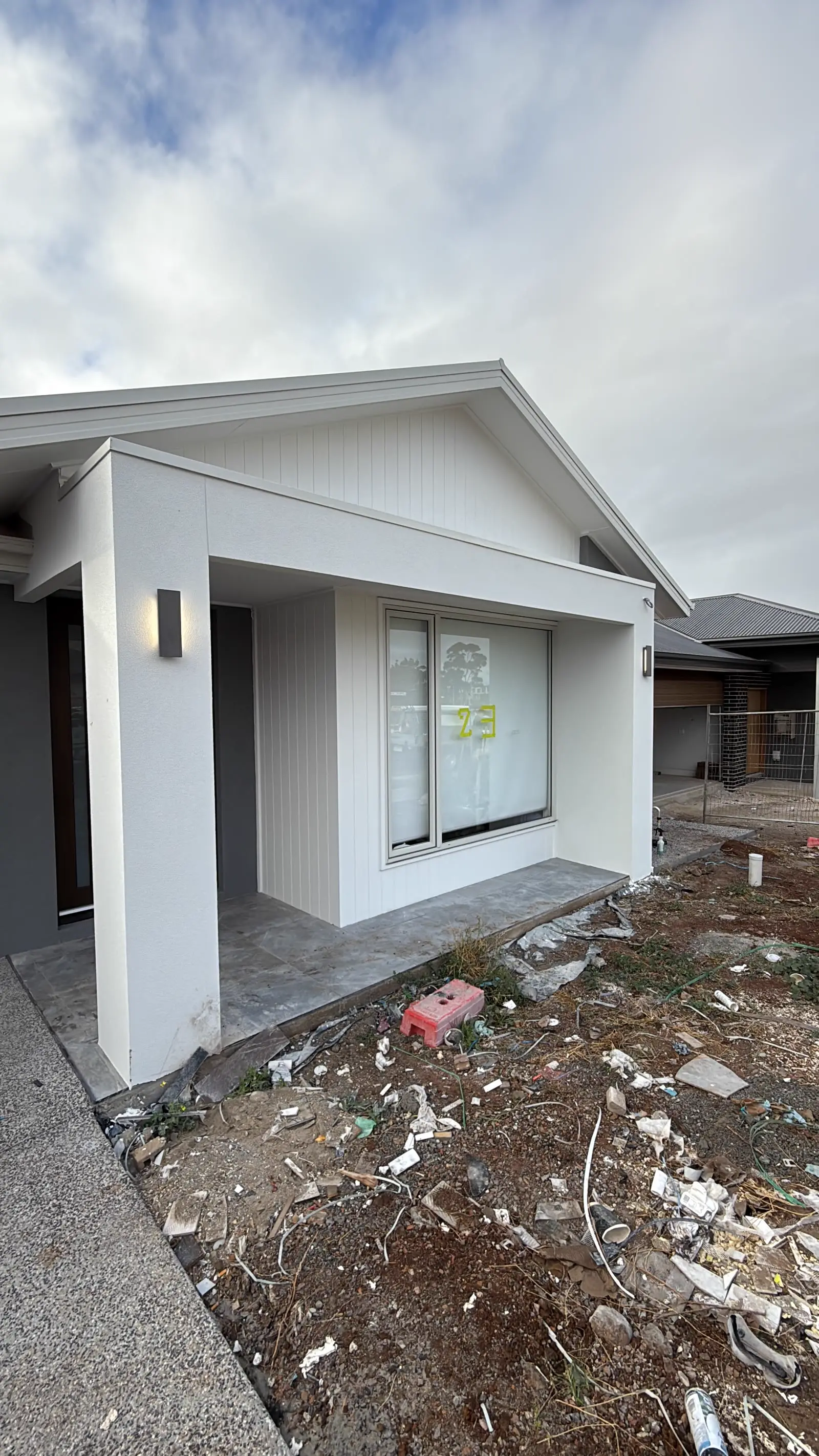 Newly painted render and eaves on a new build home by Freshy Painting Melbourne